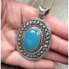 Zilveren grote hanger met blauw Chalcedoon in bewerkte setting