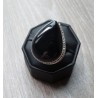 Zilveren ring gezet met grote Onyx met bewerkte setting 18 mm