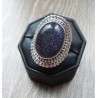 Zilveren ring gezet met Goudsteen en bewerkte kop maat 17 mm