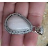 Zilveren hanger gezet met roze Aragoniet in bewerkte setting