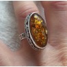 Zilveren ring met ovale Amber gezet in bewerkte setting 17.3 mm