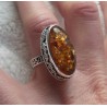 Zilveren ring met ovale Amber gezet in bewerkte setting 17.3 mm