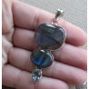 Zilveren hanger gezet met Labradoriet en blauw Topaas