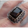 Zilveren ring met Smokey Topaas met bewerkte kop en band 18.5 mm
