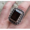 Zilveren ring met Smokey Topaas en bewerkte kop en band 17.3 mm