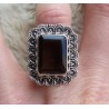 Zilveren ring met Smokey Topaas en bewerkte kop en band 17.3 mm
