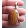 Zilveren hanger gezet met oranje / bruine Botswana Agaat
