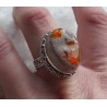Zilveren ring met Mexicaanse Vuuropaal in bewerkte setting 18.5