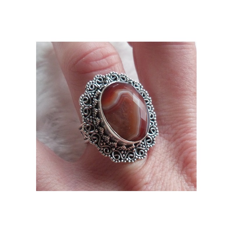 Zilveren ring facet Botswana met bewerkte kop en band 16 mm