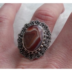Zilveren ring facet Botswana met bewerkte kop en band 16 mm