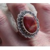 Zilveren ring Mookaiet met bewerkte kop en band 19 mm