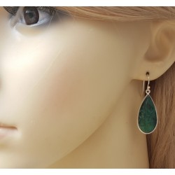 Zilveren oorbellen met uitgesneden Emerald