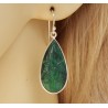 Zilveren oorbellen met uitgesneden Emerald