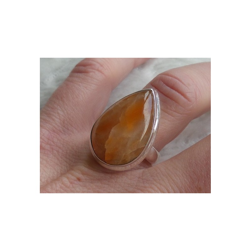 Zilveren ring gezet met druppelvorm oranje Calciet 17.3 mm