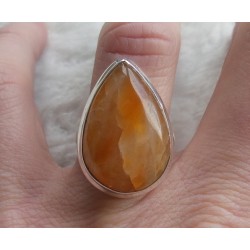 Zilveren ring gezet met druppelvorm oranje Calciet 17.3 mm