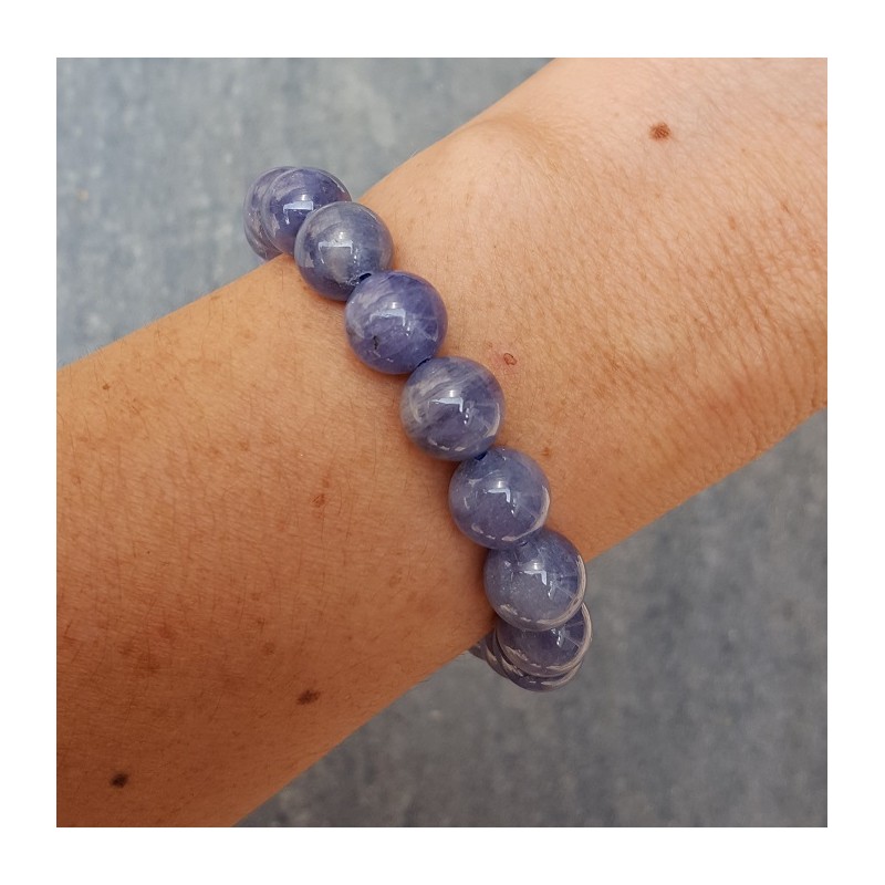 Stretch armband met Tanzaniet kralen