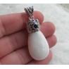 Zilveren hanger gezet met Scoleciet en Onyx