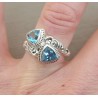 Zilveren ring gezet met twee blauwe Topazen 16.5 mm