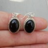 Zilveren oorbellen ovale cabochon Onyx in bewerkte setting