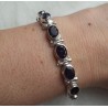 Zilveren armband gezet met ovale facet geslepen Ioliet