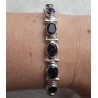 Zilveren armband gezet met ovale facet geslepen Ioliet