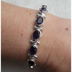 Zilveren armband gezet met ovale facet geslepen Ioliet