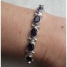 Zilveren armband gezet met ovale facet geslepen Ioliet