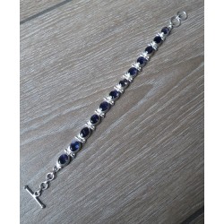 Zilveren armband gezet met ovale facet geslepen Ioliet