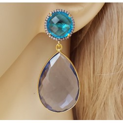 Vergulde oorbellen met blauw Topaas en Ioliet quartz