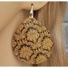 Oorbellen met grote floral bewerkte Blacklip schelp