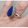 Zilveren ring gezet met Lapis Lazuli en bewerkte kop 17 mm