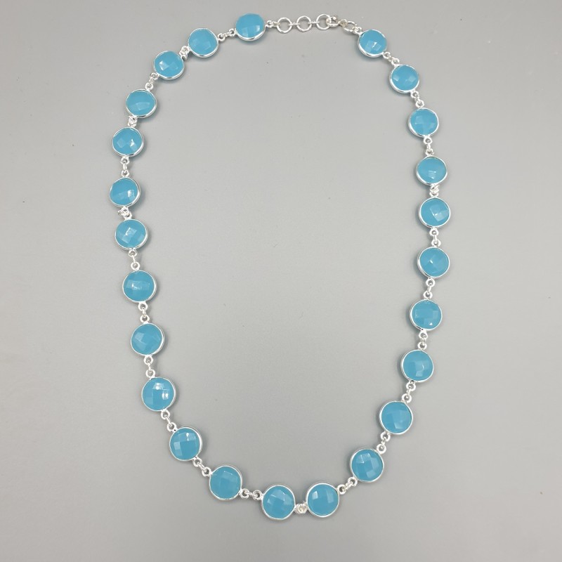 Zilveren ketting rond om gezet met ronde facet blauw Chalcedoon