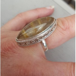 Zilveren ring met marquise gouden Rutielkwarts en bewerkte kop 17.7