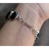 Zilveren armband gezet met ovale cabochon zwarte Onyxen