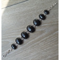 Zilveren armband gezet met ovale cabochon zwarte Onyxen