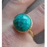 Vergulde ring gezet met dwarsliggende ovale Turkoois 17.3 mm