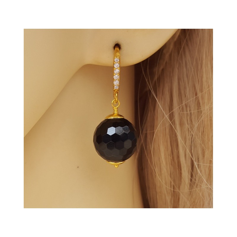 Vergulde oorbellen met zwarte Onyx