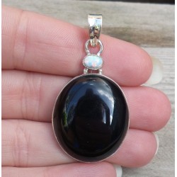 Zilveren hanger gezet met zwarte Onyx en fire Opaal