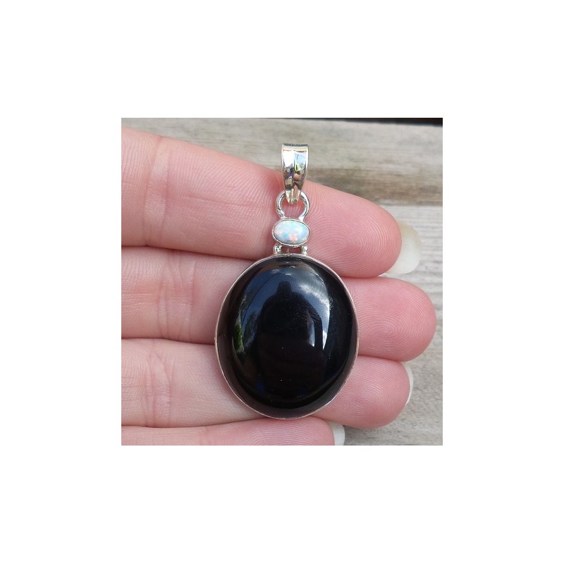 Zilveren hanger gezet met zwarte Onyx en fire Opaal