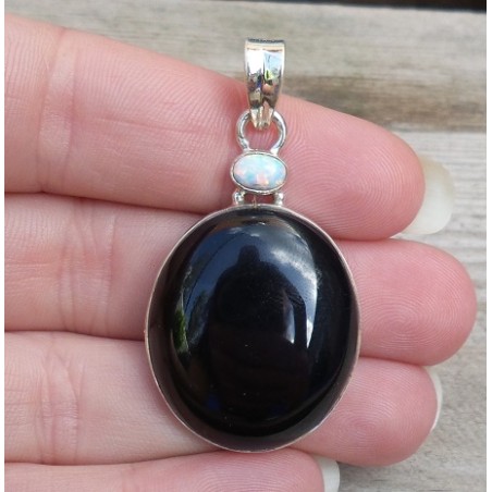 Zilveren hanger gezet met zwarte Onyx en fire Opaal