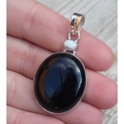 Zilveren hanger gezet met zwarte Onyx en fire Opaal