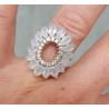 Zilveren ring met ovale facet geslepen regenboog Maanstenen 17.3