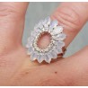 Zilveren ring met ovale facet geslepen regenboog Maanstenen 17.3
