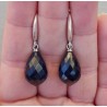 Zilveren oorbellen met grote donker blauw Saffier briolet