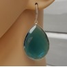 Zilveren oorbellen gezet met grote blauwe Topaas quartz