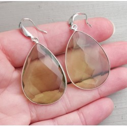 Zilveren oorbellen gezet met grote groene Amethist quartz