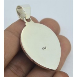 Zilveren hanger met gezicht uit been en Koraal