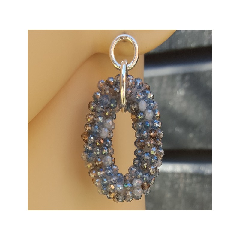 Zilveren oorbellen met ovale hanger van blauw / grijze kristalle