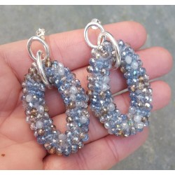 Zilveren oorbellen met ovale hanger van blauw / grijze kristalle
