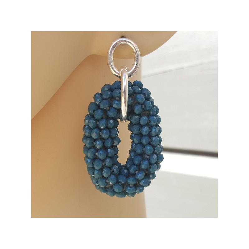 Zilveren oorbellen met jeans blauwe ovale hanger van kristallen